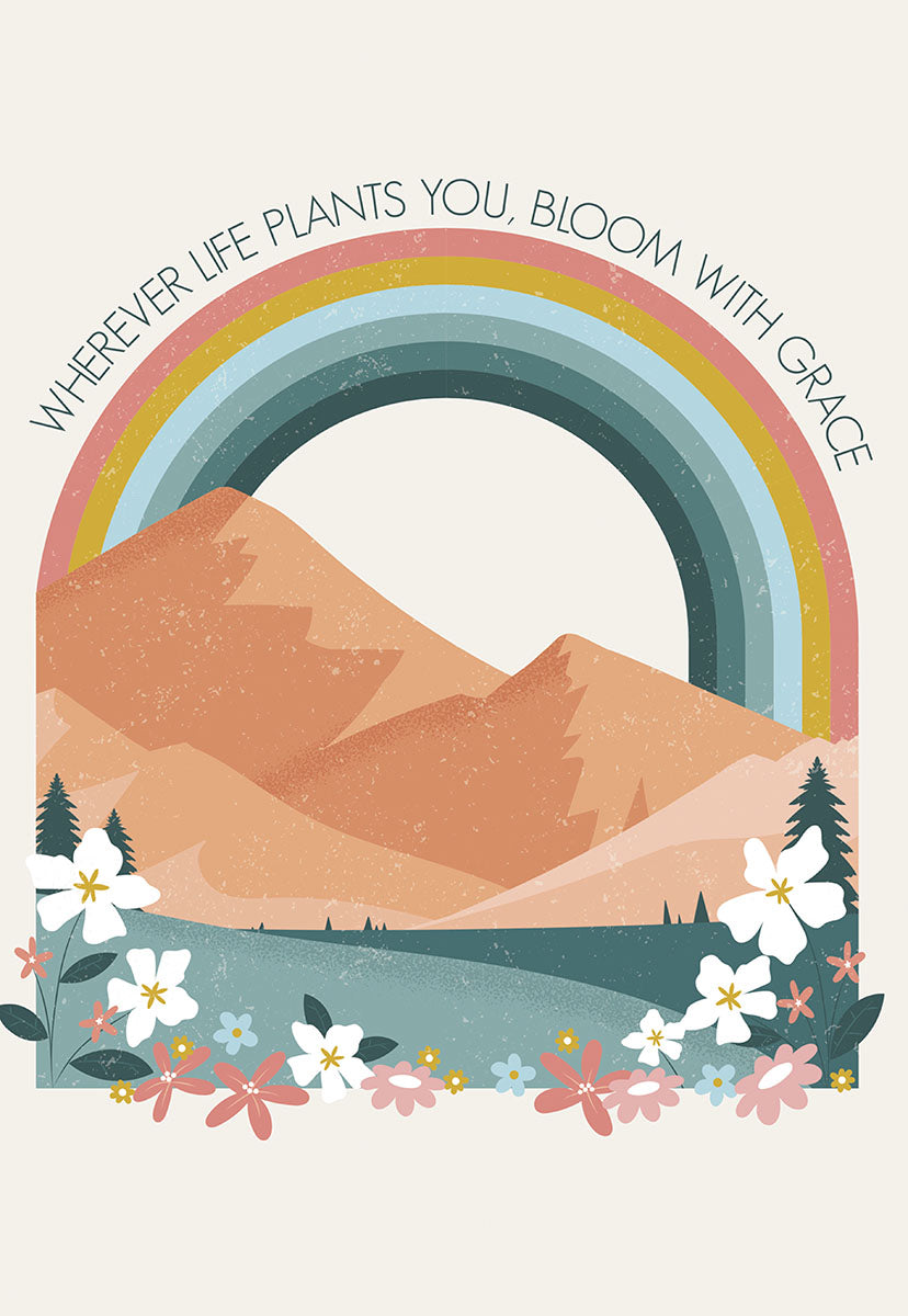Front of a card with a rainbow over mountains and flowers, text "WHEREVER LIFE PLANTS YOU, BLOOM WITH GRACE".