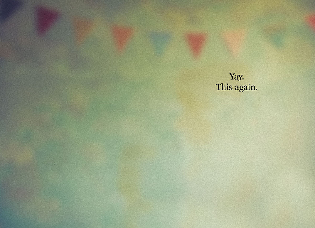 Inside view of a funny greeting card with faded, blurred colorful party flags in the background, featuring the sarcastic black text 'Yay. This again.' perfectly complementing the grumpy cat theme.