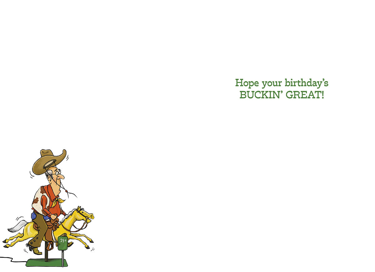 Inside view of a humorous grandparent's birthday card with a cowboy on a coin-operated horse, and text 'Hope your birthday's BUCKIN' GREAT!'. Plenty of space for a personalized message.