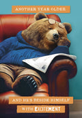Funny greeting card featuring a sleeping bear in an armchair with glasses and a newspaper, sarcastically stating 'Another year older and he's beside himself with excitement,' perfect for milestone celebrations for him.