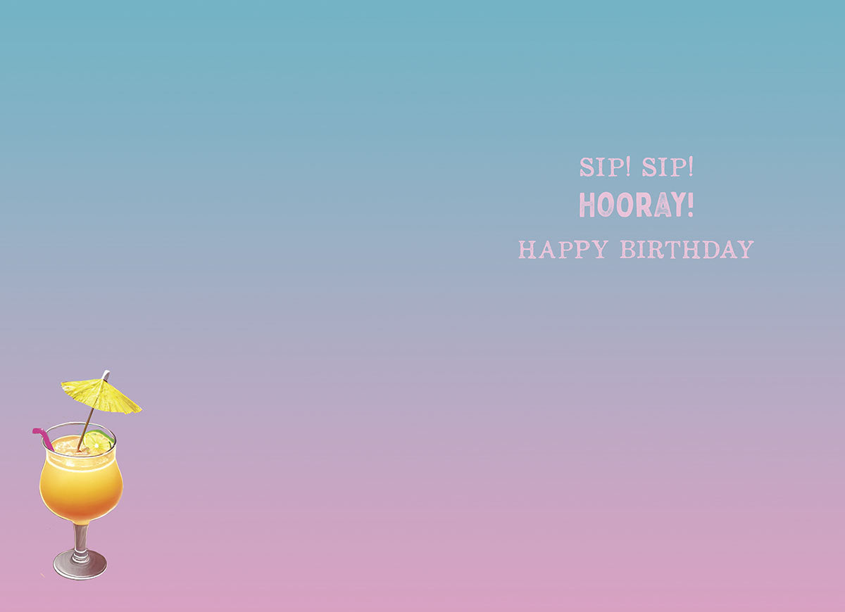Inside of a cheerful birthday greeting card with a gradient background of light blue fading to pink. A yellow cocktail glass with an umbrella is in the bottom left corner, and the text reads: SIP! SIP! HOORAY! HAPPY BIRTHDAY.