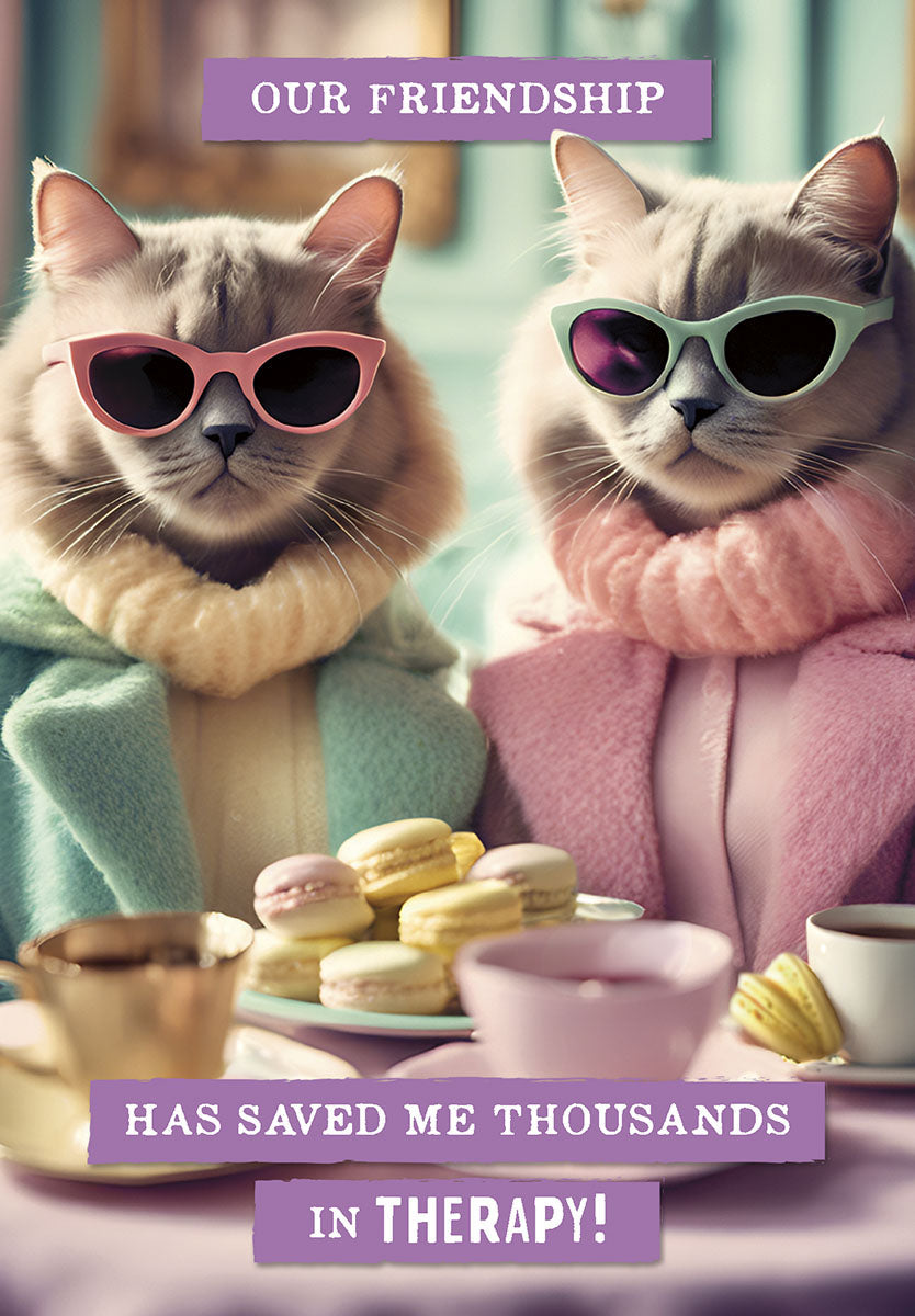 Funny cat friendship card featuring two stylish cats wearing pastel sunglasses and sweaters, enjoying macarons and tea, with the humorous text 'OUR FRIENDSHIP HAS SAVED ME THOUSANDS IN THERAPY!'