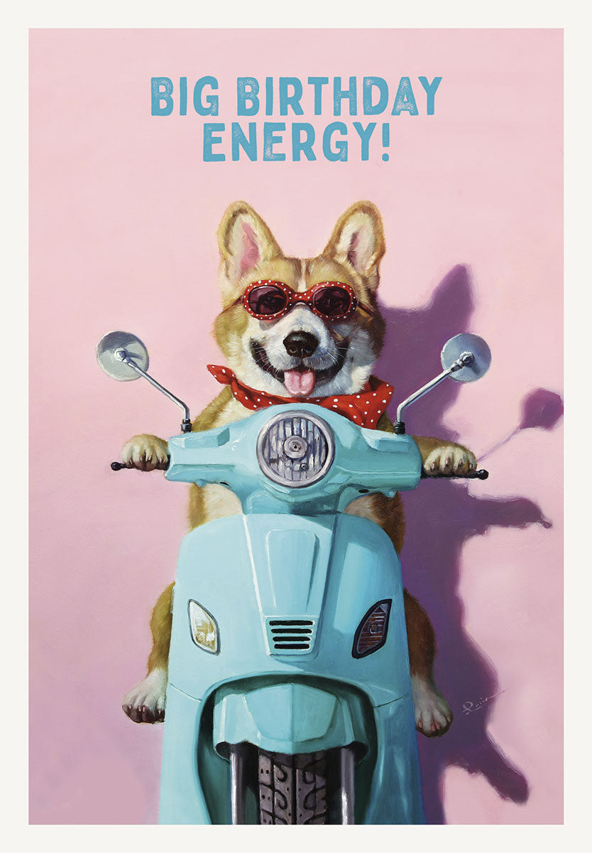 Front of a funny birthday greeting card featuring a cute corgi dog wearing red sunglasses and a polka-dot bandana, riding a light blue moped or scooter, with the bold text "BIG BIRTHDAY ENERGY!" on a vibrant pink background.