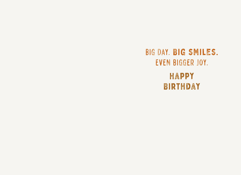 Inside of a cheerful celebration card with elegant brown text reading 'BIG DAY. BIG SMILES. EVEN BIGGER JOY. HAPPY BIRTHDAY' on a clean white background.
