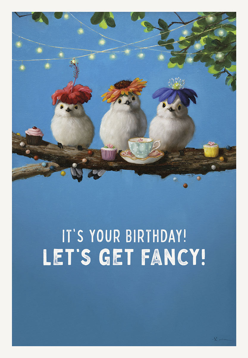 Cute bird birthday card featuring three fluffy white birds in elaborate floral hats, perched on a branch with cupcakes and a teacup, against a vibrant blue sky background. The card front reads 'IT'S YOUR BIRTHDAY! LET'S GET FANCY!'. Perfect for a friend or child's celebration.