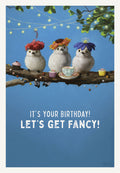 Cute bird birthday card featuring three fluffy white birds in elaborate floral hats, perched on a branch with cupcakes and a teacup, against a vibrant blue sky background. The card front reads 'IT'S YOUR BIRTHDAY! LET'S GET FANCY!'. Perfect for a friend or child's celebration.