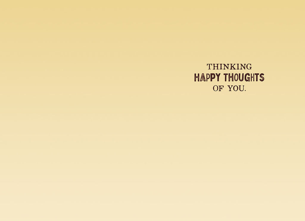 Inside of a light yellow greeting card displaying the message 'THINKING HAPPY THOUGHTS OF YOU.' in a brown font.