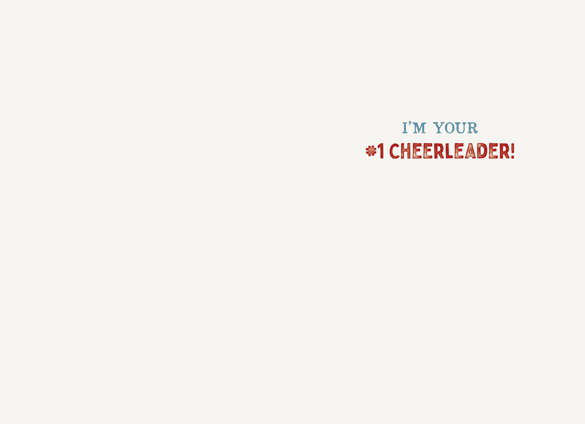 Inside of a cheering greeting card showing a minimalist design with the message "I'M YOUR #1 CHEERLEADER!" in blue and red text on a plain white background.