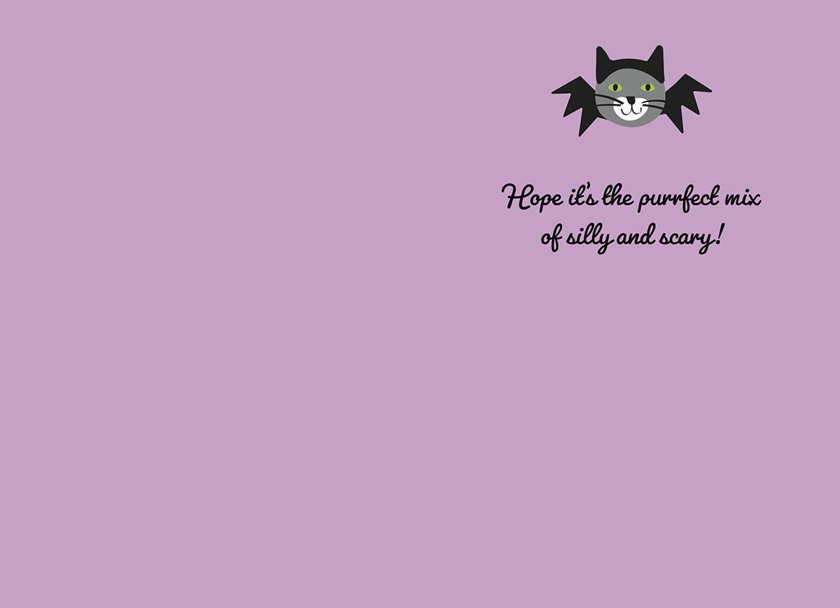 Inside of a funny Halloween card with a small bat cat illustration and the message 'Hope it's the purrfect mix of silly and scary!' on a light purple background.