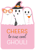 Cute Halloween greeting card front with three smiling cartoon ghosts on pink background. One ghost wears orange sunglasses, another a black witch hat and holds a broomstick, and the third sips a cocktail. Text reads 'CHEERS to one cool GHOUL!'.
