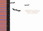 Inside view of a cute Halloween greeting card. The right side features the message 'WISHING YOU A NIGHT OF FRIENDLY FRIGHTS AND SWEET DELIGHTS!' in orange text, with flying black bat silhouettes. The left side has a festive vertical stripe pattern in purple and orange with scattered small stars.