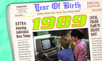 Front page of a vintage newspaper style greeting card titled 'Year Of Birth', prominently displaying '1989' in large green letters. An embedded image shows three children gathered around an old computer. Headlines include 'News from the year you were born' and 'EXTRA: Amazing Individual Born Today'.