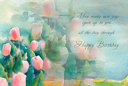 Inside of a Judy Buswell tulip greeting card with "Happy Birthday" text and soft floral background.