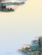 Scenic nature stationery featuring a mother bear and cubs by a lake at sunset, a rustic cabin, majestic mountains, and an eagle soaring.