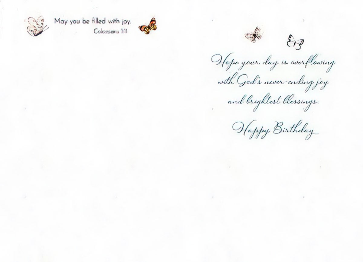 Interior of a religious birthday greeting card with elegant script, featuring a small butterfly. Text includes 'May you be filled with joy. Colossians 1:11' and 'Hope your day is overflowing with God's never-ending joy and brightest blessings. Happy Birthday'.