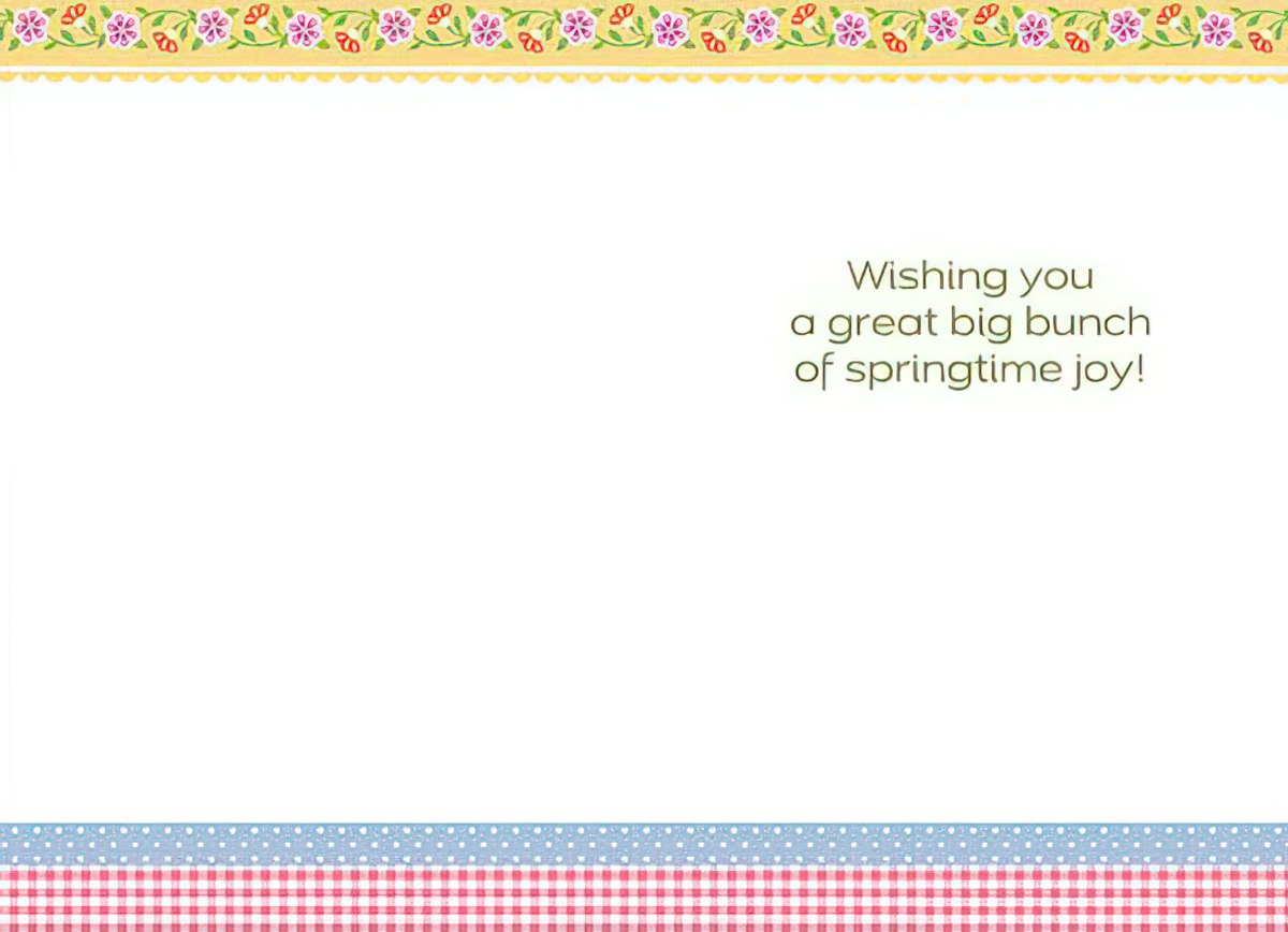 Inside of a simple white Easter greeting card displaying the message 'Wishing you a great big bunch of springtime joy!' centered on the right panel. The card features a decorative border mirroring the front, with small colorful flowers, blue polka dots, and a red and white gingham check pattern.