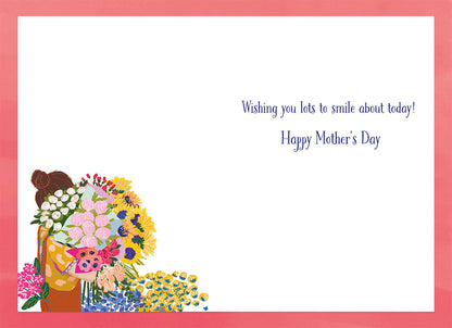 Inside view of a Mother's Day greeting card, with a 'Wishing you lots to smile about today! Happy Mother's Day' message.