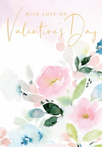 Front view of a romantic Valentine's Day greeting card for her, featuring soft watercolor pink, blue, and green floral illustrations and elegant gold script text 'With Love on Valentine's Day'.