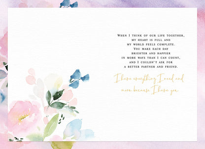 Inside of a heartfelt Valentine's Day card with a romantic message and pastel watercolor floral design.