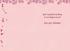 Inside view of an open Valentine's Day card, displaying a heartfelt message 'You're just the best thing to ever happen to me! Love you, Valentine' on a light pink page with subtle floral and heart accents.