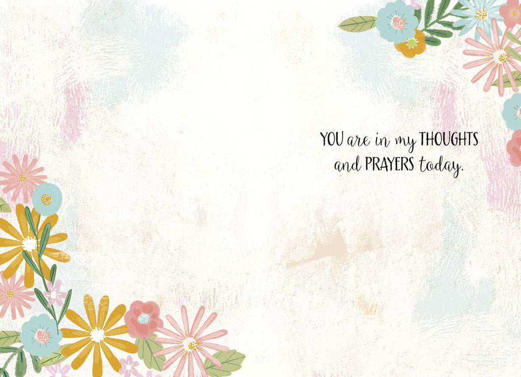 Open view of the religious encouragement greeting card showing the inside message 'YOU are in my THOUGHTS and PRAYERS today.' with delicate floral accents in the corners on a textured pastel background.