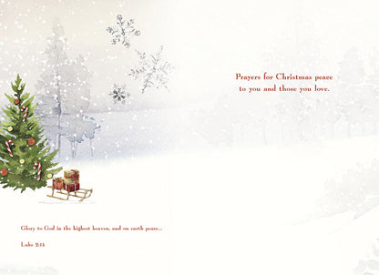 Inside of a religious Christmas card with a decorated tree, gifts, snowflakes, and scripture 'Prayers for Christmas peace' Luke 2:14.