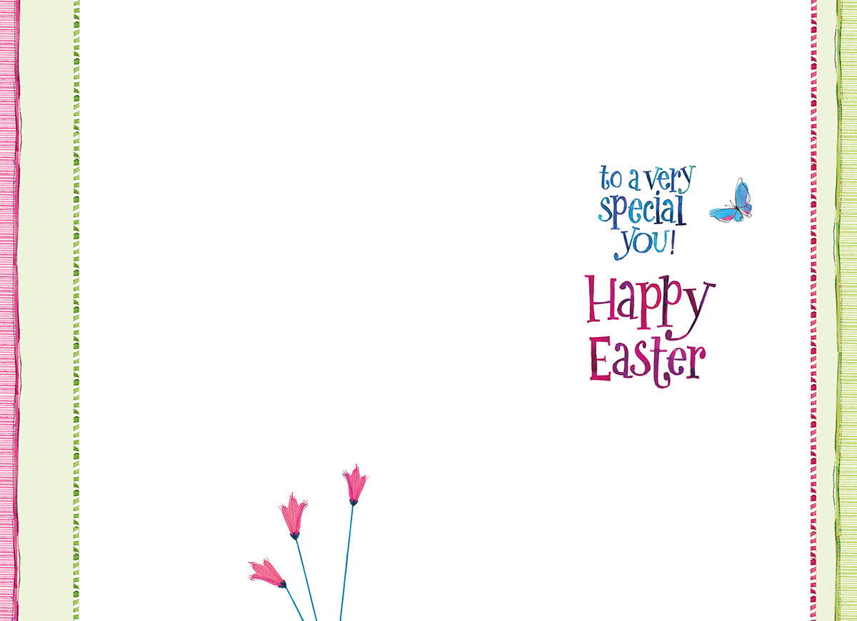 Inside of a thoughtful greeting card with minimal decoration, including three pink flowers at the bottom left. Message 'to a very special you! Happy Easter' and a blue butterfly are on the right side against a white background.