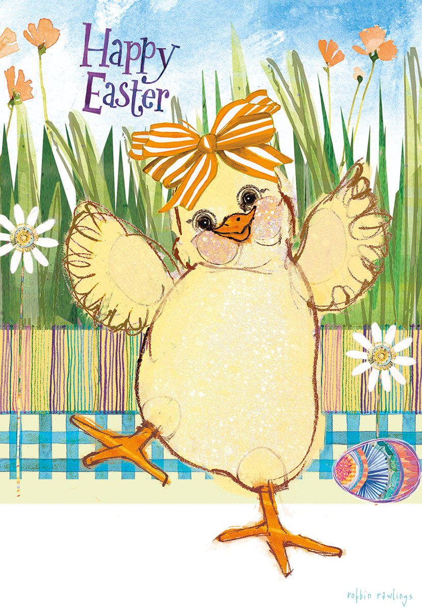 Front of a cheerful Easter greeting card featuring a fluffy yellow chick wearing an orange striped bow on its head, standing in a vibrant green grassy field with colorful flowers and a blue sky background. The text 'Happy Easter' is prominently displayed in purple script. An adorned Easter egg rests at the bottom.