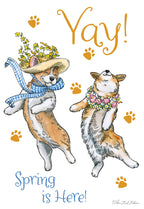 Front of a cute spring greeting card featuring two dancing corgis, one in a straw hat with a blue plaid scarf and the other with a floral lei, surrounded by paw prints and text 'Yay! Spring is Here!'.