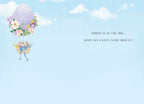Inside view of a charming spring greeting card showing the continued watercolor hot air balloon design on the left, with text 'SPRING IS IN THE AIR... HOPE YOU ENJOY EVERY MINUTE!' on the right, set against a serene blue sky background.