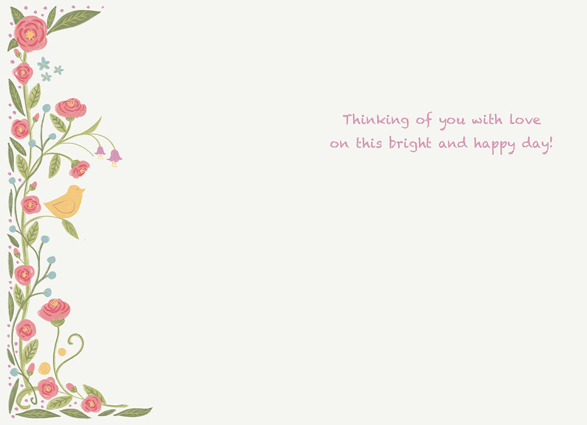 Interior of an elegant holiday card, showcasing a border of pink flowers, green foliage, and a yellow bird, with a printed message: 'Thinking of you with love on this bright and happy day!'