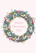 Front of a beautiful Mother's Day greeting card featuring a vibrant wildflower wreath on a pale pink background with 'Happy Mother's Day' text in the center.