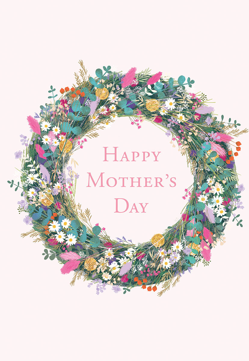 Front of a beautiful Mother's Day greeting card featuring a vibrant wildflower wreath on a pale pink background with 'Happy Mother's Day' text in the center.