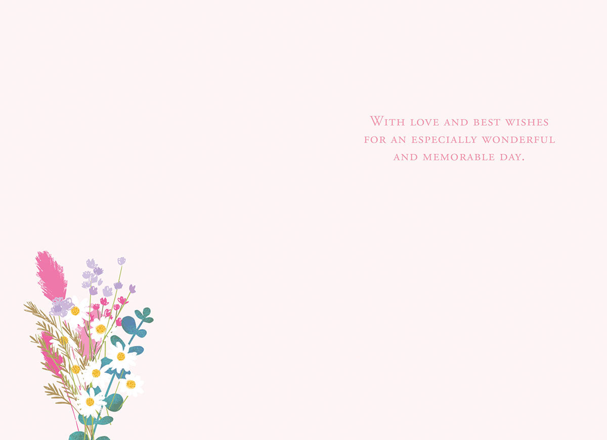 Inside of a Mother's Day greeting card with a small bouquet of wildflowers in the bottom left corner and heartfelt wishes on the right: 'With love and best wishes for an especially wonderful and memorable day.'