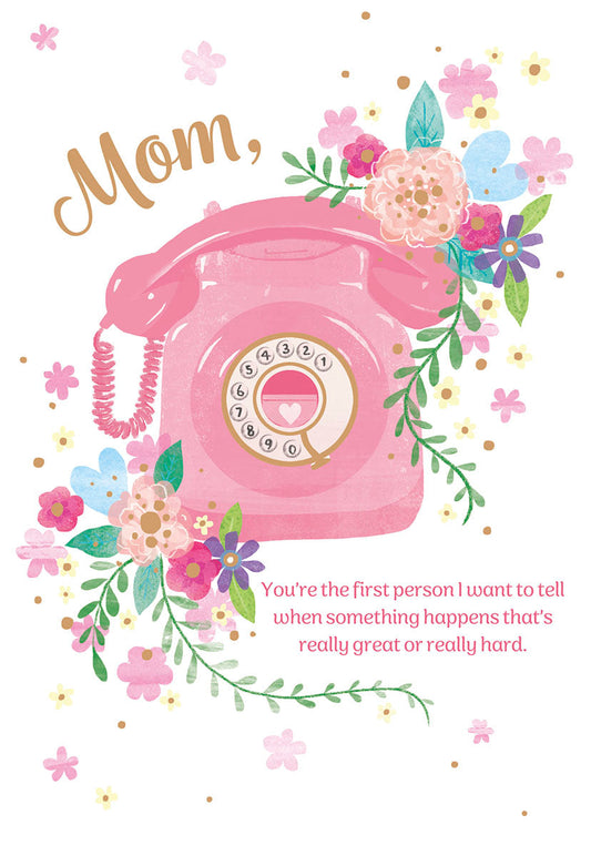 Front of a pink rotary phone greeting card with 'Mom,' and floral accents. "You're the first person I want to tell when something happens that's really great or really hard."