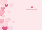 Inside of a Valentine's Day greeting card showing a blank pink surface for a personalized message, bordered on the left by soft watercolor hearts, with 'HAPPY VALENTINE'S DAY' and a small red heart on the right.