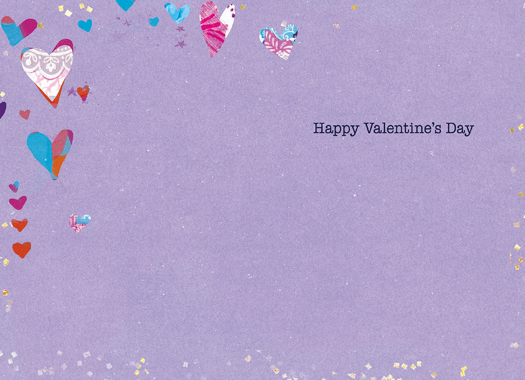 Inside of the Valentine's Day greeting card, showing a light purple background with scattered gold glitter. The text 'Happy Valentine's Day' is centered on the right side, with ample space for a personal message.