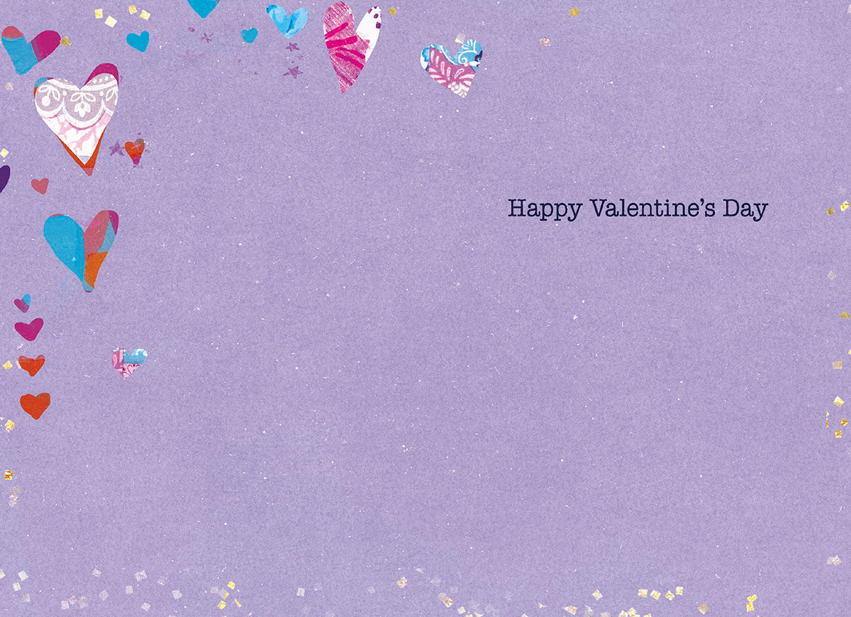 Inside of the Valentine's Day greeting card, showing a light purple background with scattered gold glitter. The text 'Happy Valentine's Day' is centered on the right side, with ample space for a personal message.