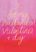 Front of a Valentine's Day greeting card for a husband, featuring gold foil calligraphy saying 'for my husband on Valentine's Day' against a vibrant pink to red gradient background with small heart accents.