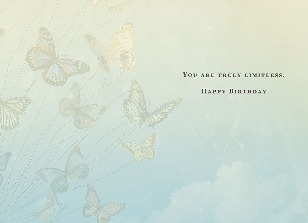 Inside of an inspiring greeting card with faint butterfly graphics and empowering text: 'YOU ARE TRULY LIMITLESS. HAPPY BIRTHDAY'.