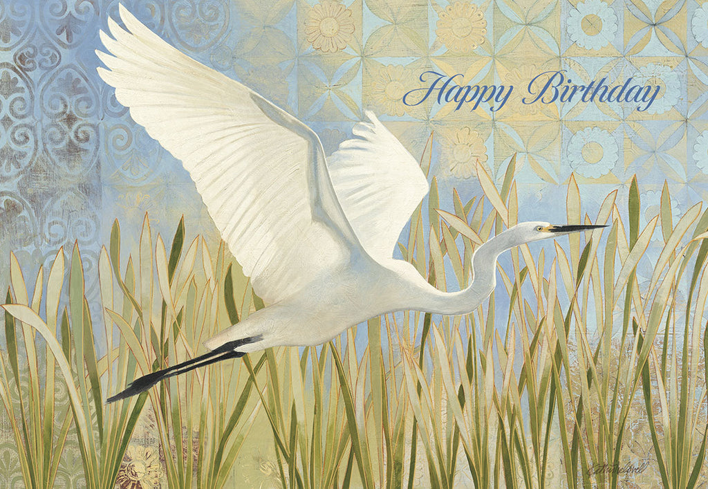 Elegant greeting card featuring a majestic white egret soaring over green marsh reeds with intricate blue and gold patterned background. 'Happy Birthday' is written in elegant script on the front.