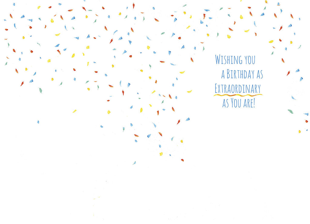 The inside of a white greeting card featuring a cascade of colorful confetti (red, orange, yellow, blue) falling from the top. On the upper right side, the message "WISHING YOU A BIRTHDAY AS EXTRAORDINARY AS YOU ARE!" is printed in a playful blue and orange font, conveying a heartfelt birthday sentiment.