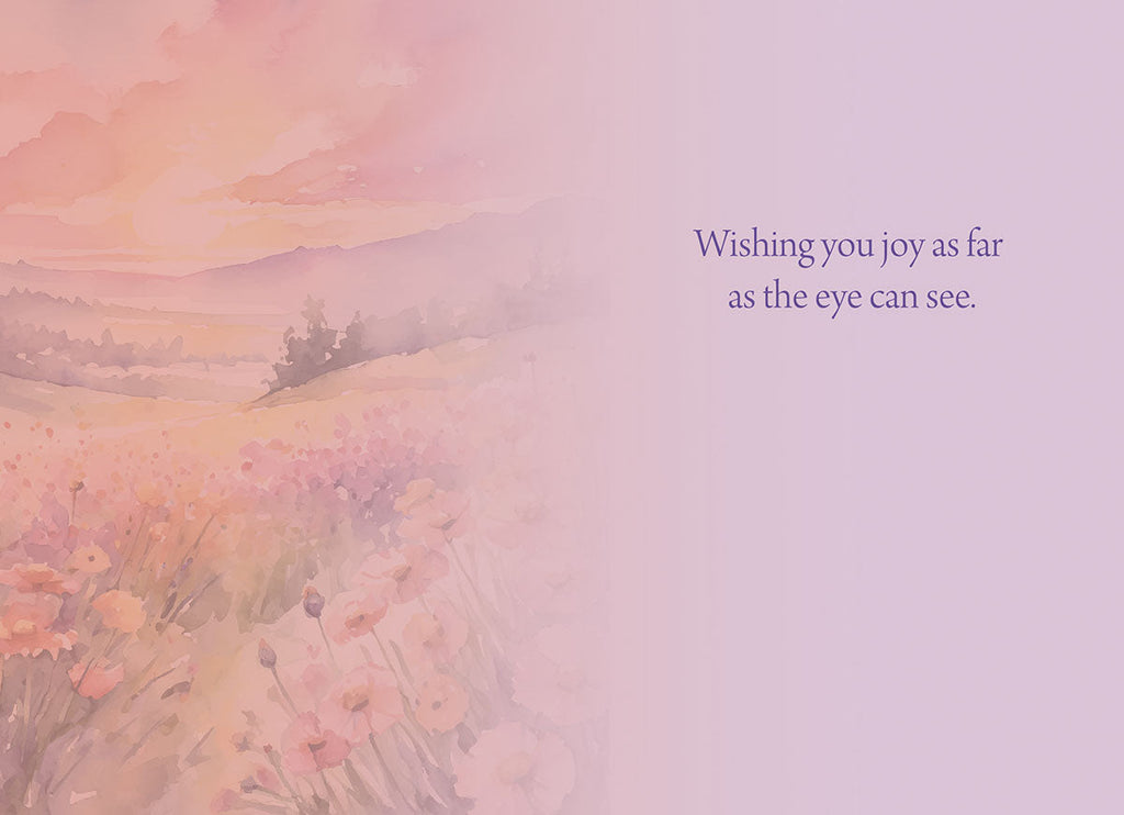 Inside of a watercolor landscape greeting card, echoing the design on the front. The left side subtly shows the continuation of the vibrant wildflower field under a soft pastel sky. On the right, the heartfelt message 'Wishing you joy as far as the eye can see.' is printed in a graceful purple script, conveying sincere and expansive good wishes.