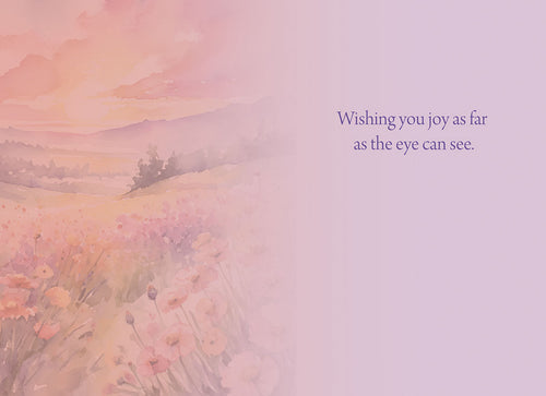 Open watercolor greeting card showing a faded floral landscape with the heartfelt message, 'Wishing you joy as far as the eye can see.'