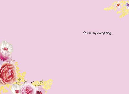 Inside of a heartfelt greeting card on a soft pink background, adorned with matching pink floral arrangements in the corner and the tender message 'You're my everything.', suitable for expressing deep affection.