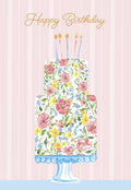 Elegant two-tier floral birthday cake greeting card, featuring pink, yellow, and blue watercolor flowers on a white cake with four lit candles, against a soft pink striped background. Perfect for a friend.