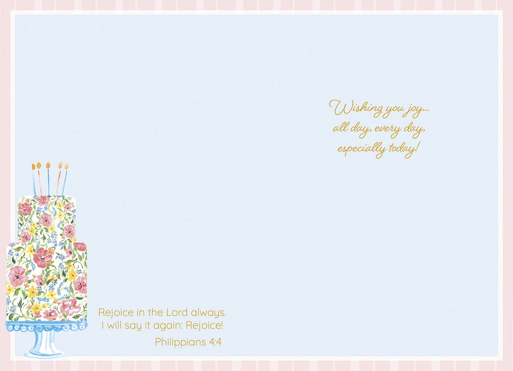 Inside of a religious birthday greeting card for a friend, showing a partial floral cake, with heartfelt scripture Philippians 4:4 'Rejoice in the Lord always' and 'Wishing you joy... especially today!' in elegant gold script.