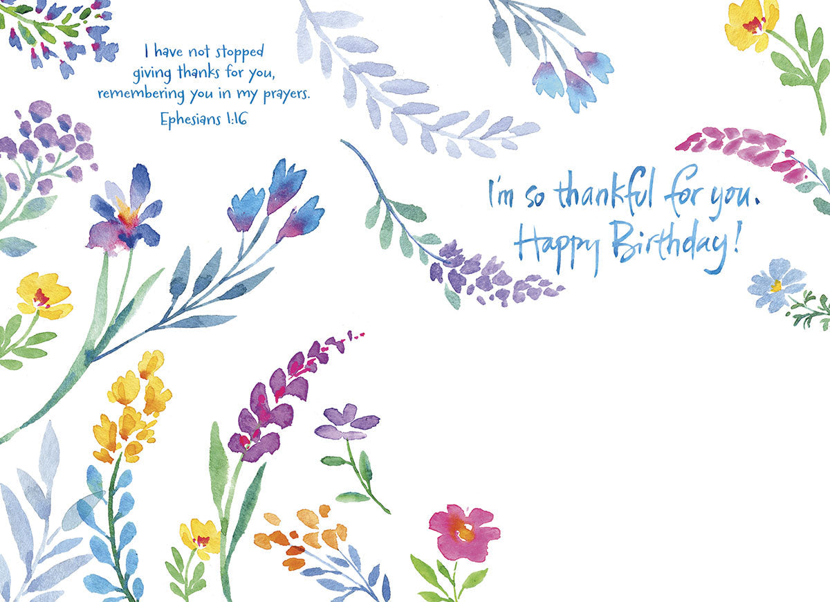 Inside of religious birthday card showing 'I'm so thankful for you. Happy Birthday!' and 'Ephesians 1:16' with colorful watercolor flowers.