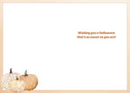 Inside of a greeting card with a sweet Halloween message 'Wishing you a Halloween that's as sweet as you are!' in orange text, accented by three watercolor patterned pumpkins in the bottom left corner.