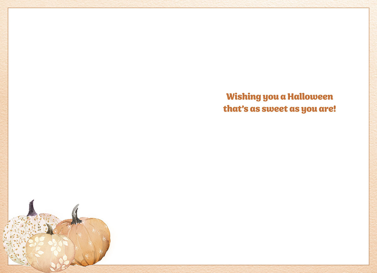 Inside of a greeting card with a sweet Halloween message 'Wishing you a Halloween that's as sweet as you are!' in orange text, accented by three watercolor patterned pumpkins in the bottom left corner.